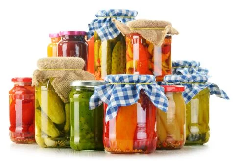 Composition with jars of pickled vegetables. Marinated food Stock Photos