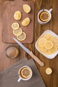 Composition with lemon tea on a wooden table Stock Photos