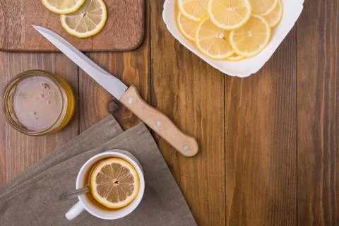 Composition with lemon tea on a wooden table Stock Photos