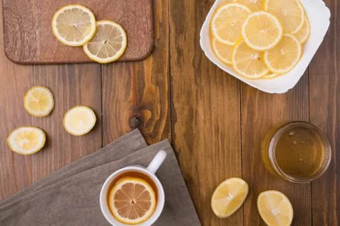Composition with lemon tea on a wooden table Stock Photos