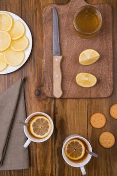 Composition with lemon tea on a wooden table Stock Photos