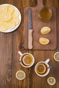 Composition with lemon tea on a wooden table Stock-Fotos