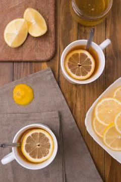 Composition with lemon tea on a wooden table 写真素材