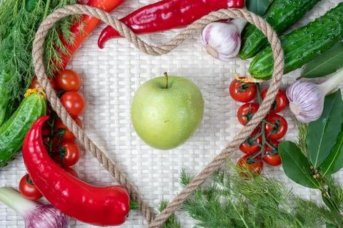 Composition on a light background of fresh organic vegetarian products Stock Photos