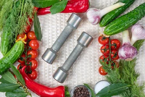 Composition on a light background of fresh organic vegetarian products Stock Photos