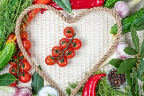 Composition on a light background of fresh organic vegetarian products Stock Photos
