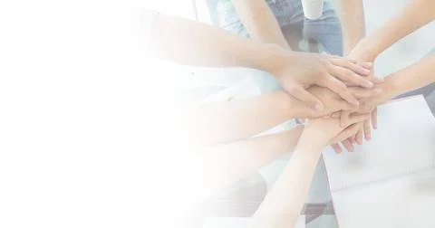 Composition of light background over group of young businesspeople teaming up Foto stock