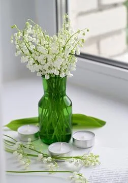 Composition of lily of the valley. Spring concept. A gift to a woman. Stock Photos