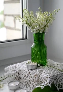 Composition of lily of the valley. Spring concept. A gift to a woman. Stock Photos