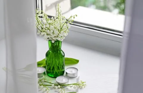 Composition of lily of the valley. Spring concept. A gift to a woman. Stock Photos