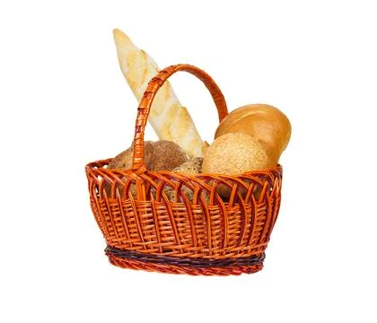 Composition with loafs of bread in wicker basket isolated on white background Stock Photos