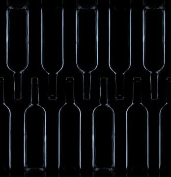 Composition of low-key lighted bottles Foto stock