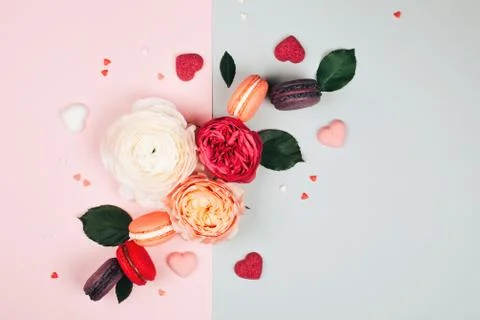 Composition of macarons and flowers Stock Photos