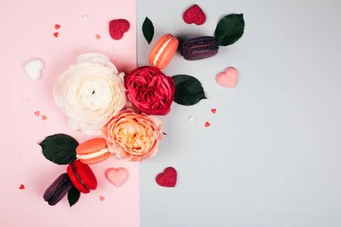 Composition of macarons and flowers Stock Photos