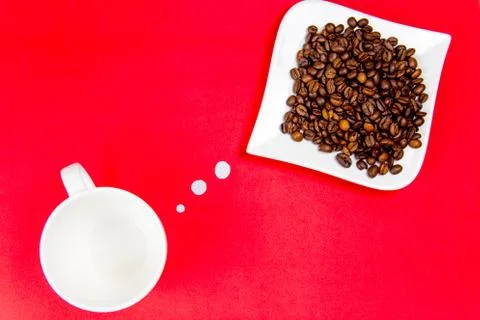 Composition made of coffee beans and a cup Stock Photos