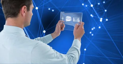 Composition of man using medical research data interface screen, with network of Stock Photos