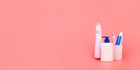 Composition with manual toothbrush, irrigatoro, toothpaste,  oral hygiene p.. Stock Photos