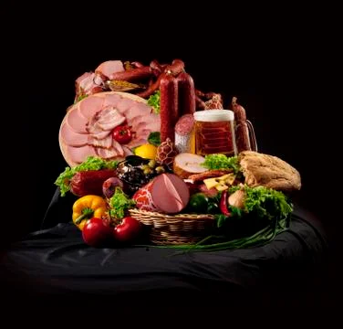 A composition of meat and vegetables with beer Stock Photos