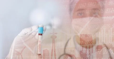 Composition of medical data processing over in face mask and covid 19 tube blood Stock Photos