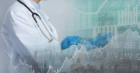 Composition of medical data processing over doctor putting surgical gloves on Foto stock