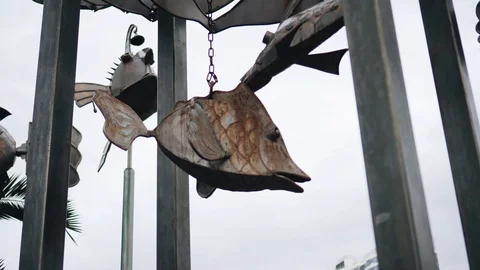 The composition of the metal fish. Fish are cooked from metal. Cool composition. 스톡 동영상 122774498