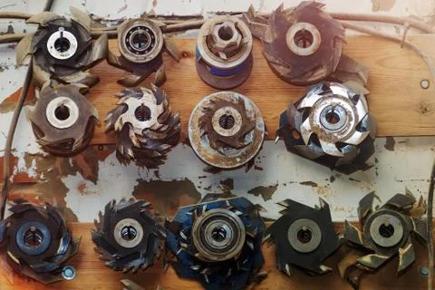 Composition of Milling Circular Saws. Carpenter Tools on Workplace. Stock Photos