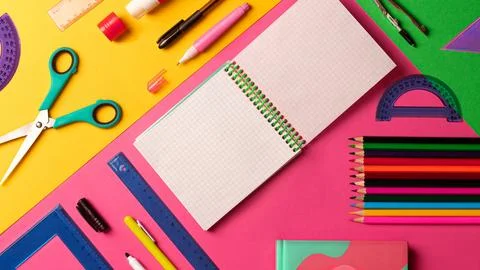 Composition of multi-colored stationery items laid out on the table. office.. Stock Photos