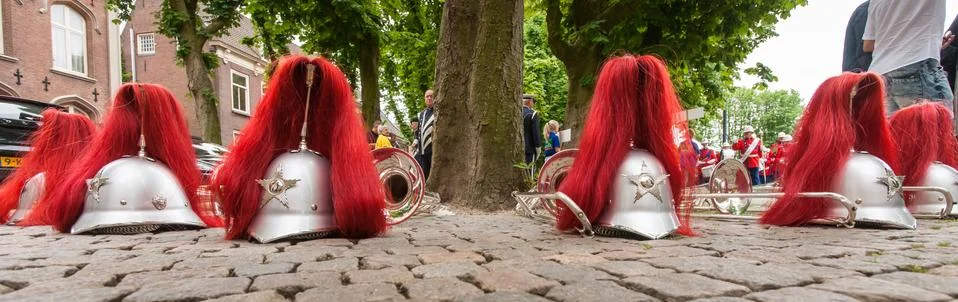 Composition of musical instruments on the ground in a row. Stock Photos