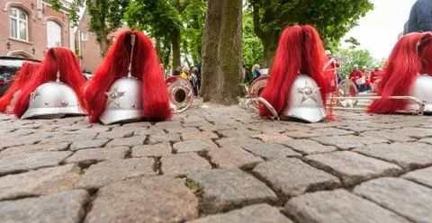 Composition of musical instruments on the ground in a row. Stock Photos