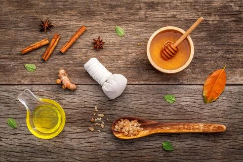 Composition of nature spa ingredients on the dark wooden table. Spa and wel.. Stock Photos