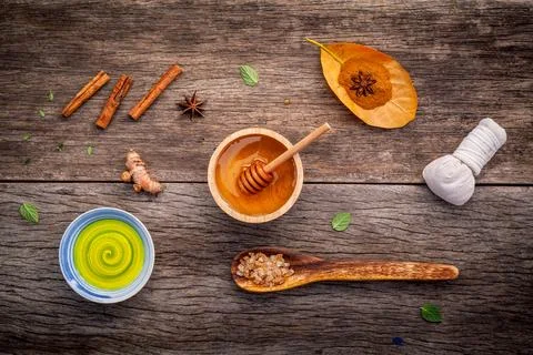 Composition of nature spa ingredients on the dark wooden table. Spa and wel.. Stock Photos