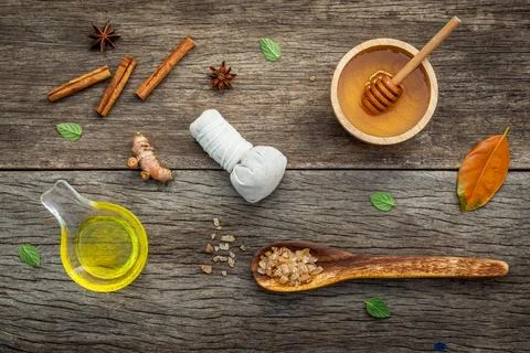 Composition of nature spa ingredients on the dark wooden table. Spa and wel.. Stock Photos