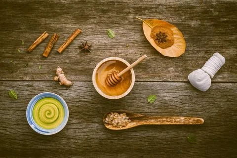 Composition of nature spa ingredients on the dark wooden table. Spa and wel.. Stock Photos