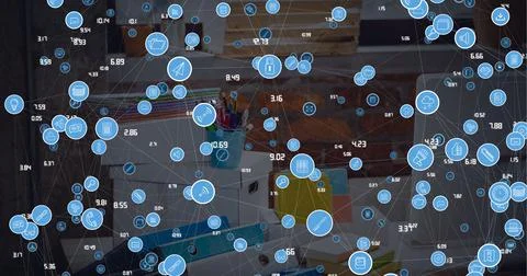 Composition of network of connections with icons over computer in office Stock Photos