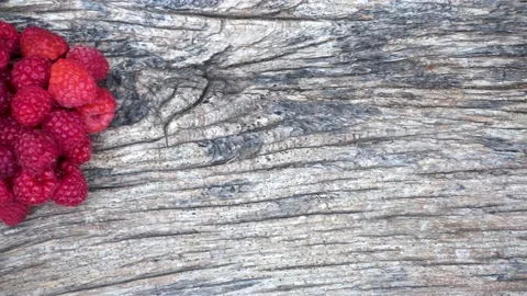 Composition with non-gmo red raspberries on the table. Stock Footage 202360939