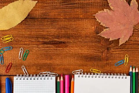 Composition with notebook blank page colorful pencil, marker and pen mock-up  Stock Photos