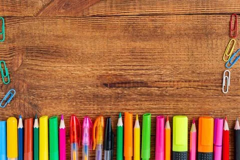 Composition with notebook blank page colorful pencil, marker and pen mock-up  Stock Photos