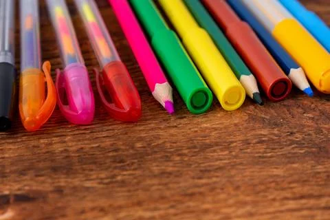 Composition with notebook blank page colorful pencil, marker and pen mock-up  Stock Photos
