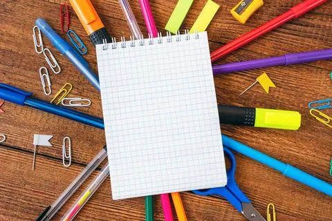 Composition with notebook blank page colorful pencil, marker and pen mock-up  Stock Photos