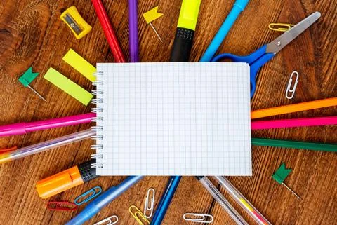 Composition with notebook blank page colorful pencil, marker and pen mock-up  Stock Photos
