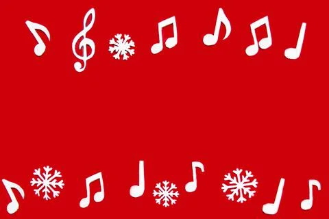 Composition with notes and christmas decorations on red background. Stock Photos