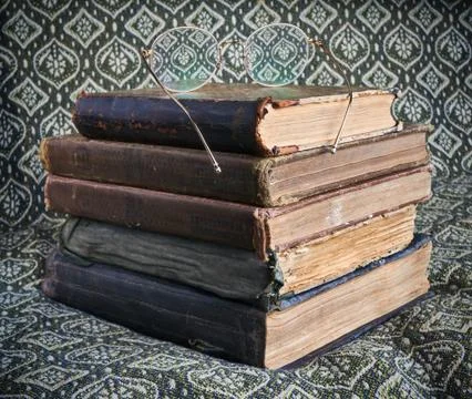 Composition of old books in a stack Stock Photos