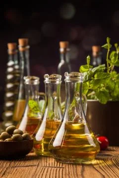 Composition of olive oils in bottles Stock Photos