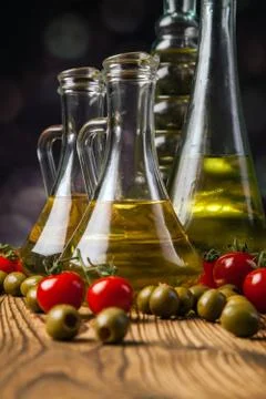 Composition of olive oils in bottles Stock Photos