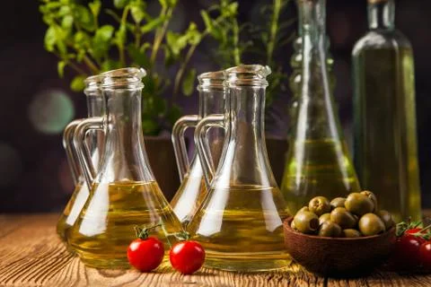 Composition of olive oils in bottles Stock Photos