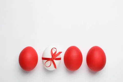 Composition of painted red Easter eggs on white background, top view 스톡 사진
