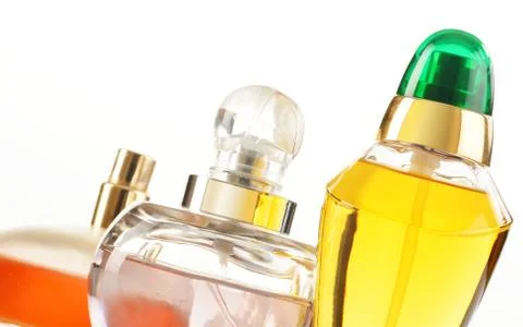 Composition with perfume bottles on white background Stock Photos
