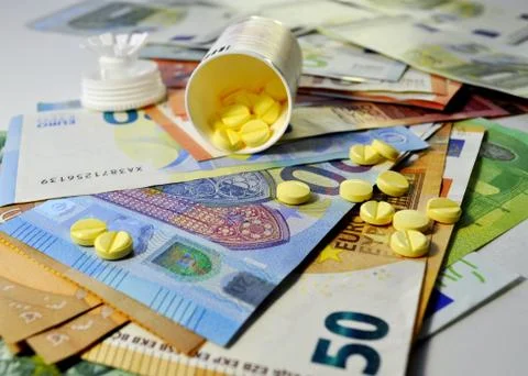 Composition photo of money and pills. Tablets. Banknotes Money with medicines. Stock Photos