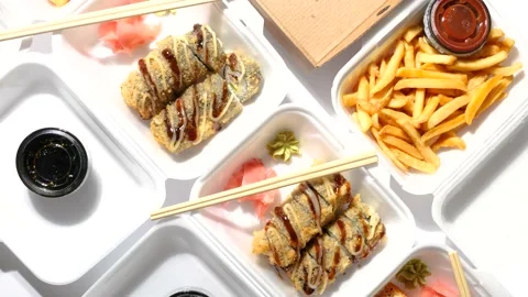 Composition of Pizza and Sushi Roll fast food Stock Footage 165614750