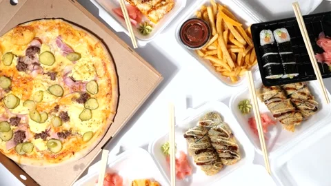 Composition of Pizza and Sushi Roll fast food Stock Footage 165614964